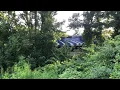 MBTA 1056 on the Fitchburg Line chugging through the trees