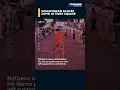 Download Lagu A man in Baju Melayu performed the traditional Zapin Gemersik Ombak dance at Time Square, New York🕺🏼