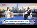 Katrina Campins Leg More in a Peek-a-Boo Slit of thr Fox Business Channel
