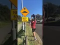 PEDESTRIAN FOLLOWS TRAFFIC SIGNS
