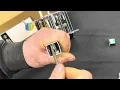 Disassembly of the Northern Light Multi-Light rattle reel prior to mounting on the UnderCover Guide