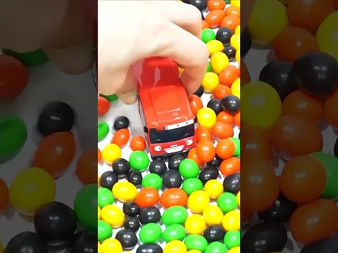 Toy Car Race Through Chocolate Balls! Fun Kids Video