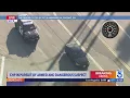 CHP officers chase armed suspect driver