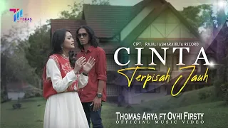 Download Thomas Arya feat Ovhi Firsty - CINTA TERPISAH JAUH (Official Music Video) MP3