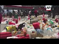 Drone footage of queue at petrol station in Indonesia disaster zone