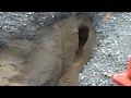 Overflowing storm drain in Augusta causing property damage to residents