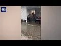 Sandy neighborhoods clean up after 100 year rain storm leaves flooding damage