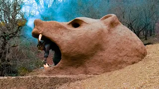 Building comfortable bear-shaped survival shelter in the wild and camping. Speed Up version.