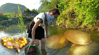 Rural sexy girl hunts for treasures in the wild, finding valuable pearls in huge mutated river clams