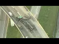 Truck overturns on I-285 ramp to I-85 on Spaghetti Junction