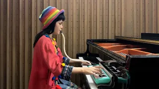 Emilie Plays "Rises the Moon" by Liana Flores on Melodian and Piano