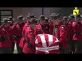 Fallen Maine game warden s casket carried into Cross Insurance Center in Bangor
