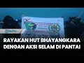 Download Lagu Biddokkes Polda Sulteng Rayakan HUT Bhayangkara dengan Aksi Selam di Pantai Tanjung Karang