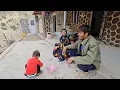 rural life . Babak paints the doors and windows of the kitchen and bathroom