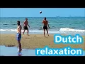 Download Lagu Dutch relaxation. Relax, It's just a Dutch summer. North Sea. Noordwijk. The Dutch collect shells.