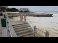 Sea foam takes over beach