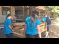 Moving bunk beds at the Olympic field