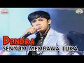 Download Lagu Dendra - Senyum Membawa Luka (Official Music Video)