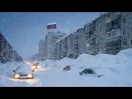 Lagu Kamtsjatka nu: 10 meter sneeuw bedekt voertuigen, wegen en hoge gebouwen in Rusland.