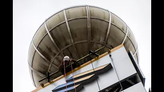 Flint s iconic weather ball gets facelift with new bank s letters downtown
