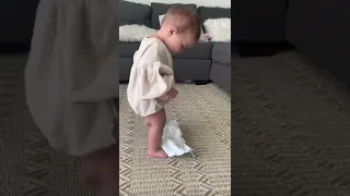 1 Year Old Baby Is Trying To Change Her Diaper