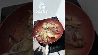 Cooking Filipino fish on our Catalina 30 in San Diego