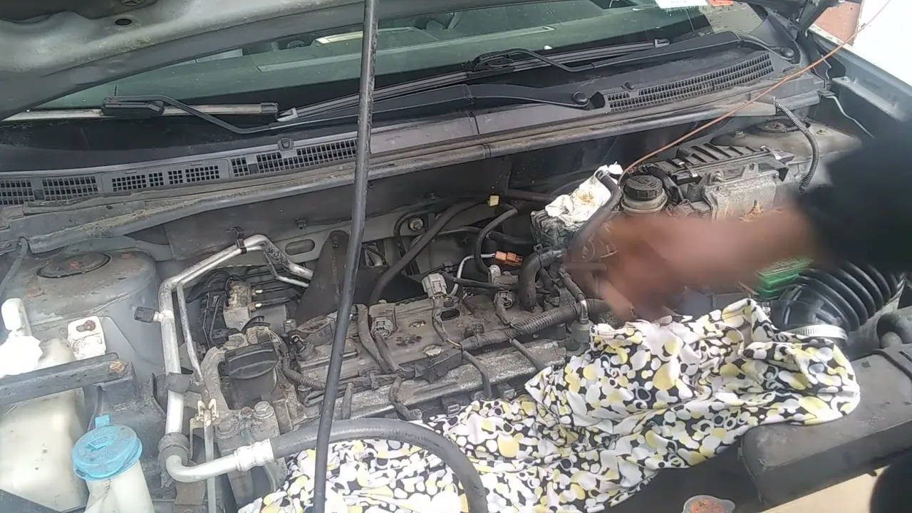 Changing Spark Plugs On 2012 Nissan Sentra Pt3