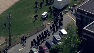Mass officer accidentally fires gun during response to hoax school shooting call