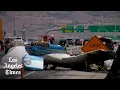Small plane crash-lands on 91 Freeway in Corona pilot and passenger escape uninjured