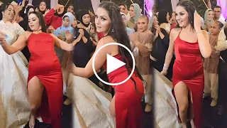 ايه الفضايح دي شاهد رقص صاحبة الفستان الأحمر ولعت فرح صاحبتها بفستانها ورقصها المثير 