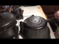 Making waffles in an antique cast iron waffle iron