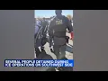 Federal agents take people into custody at Chicago flea market protesters detained nearby