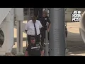 Moment Frontier Airlines pilot is dragged off flight by police after warrant issued for his arrest