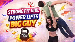 tall strong girl power lift and carry tall man 