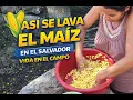Women and their daily activities in the field washing corn to take it to the mill in El Salvador
