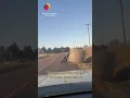 Missouri state trooper moves large hay bale off road with bare hands