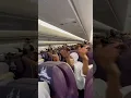 Download Lagu Jamaah Haji Demak 2025 sedang senam perenggangan di dalam pesawat garuda menuju Madinah - Arab Saudi