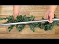 Stick a tension rod into a Christmas garland for this GENIUS kitchen idea