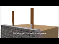 Wood Post in retaining wall finish