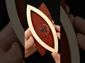 Shift the lid of the Eye of Horus puzzle box to reveal the ball bearings
