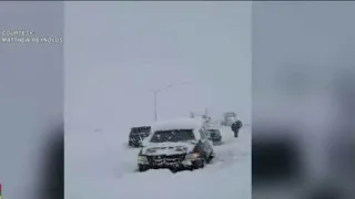 Snow brings I-40 traffic to screeching halt in Kingman