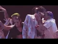 Bad bunny kisses a guy on stage