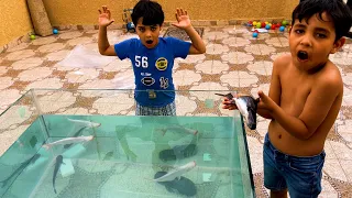 الياس قرر يمسك سمك القرش من حوض السمك تعالو شوفوا كيف 