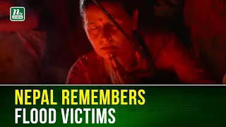 Nepalis brave heavy rain to honour Nepal flood victims with candle vigil | NTV Global