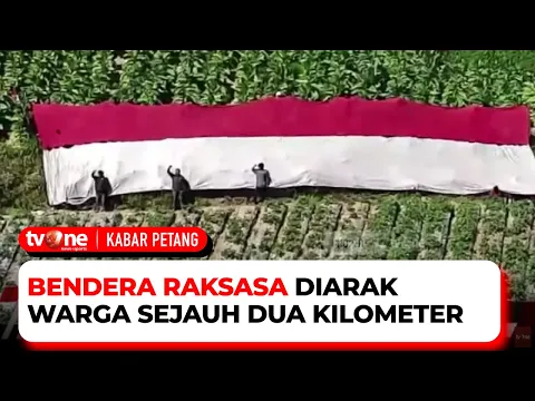 Warga Kibarkan Bendera Raksasa di Lereng Merapi
