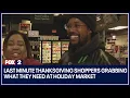 Last minute Thanksgiving shoppers grabbing what they need at Holiday Market