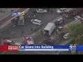 Car Slams Into Building Following Multi-Vehicle Crash 8 Injured