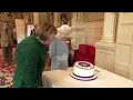Queen Elizabeth cuts cake to mark 70 years of rule