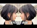 Elegant Textured Layered Bob Haircut with Natural Volume Soft Bob Hair Cutting Technique