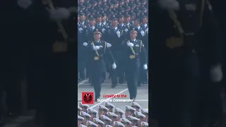 An Elegant Parade With Rhythmic Salutes And Raised Arms 